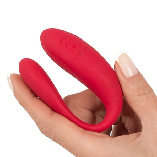 Sweet Smile We-Vibe Special Edition Rechargeable Couples Vibrator (Ruby) In Hand